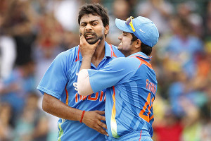 Suresh Raina congratulates the bowler in his peculiar style